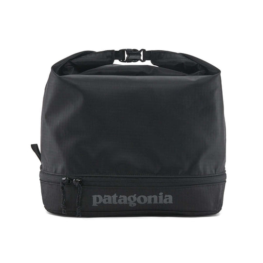 Black Hole MLC Cube in black with roll-top design and zippered compartment, 12L capacity.