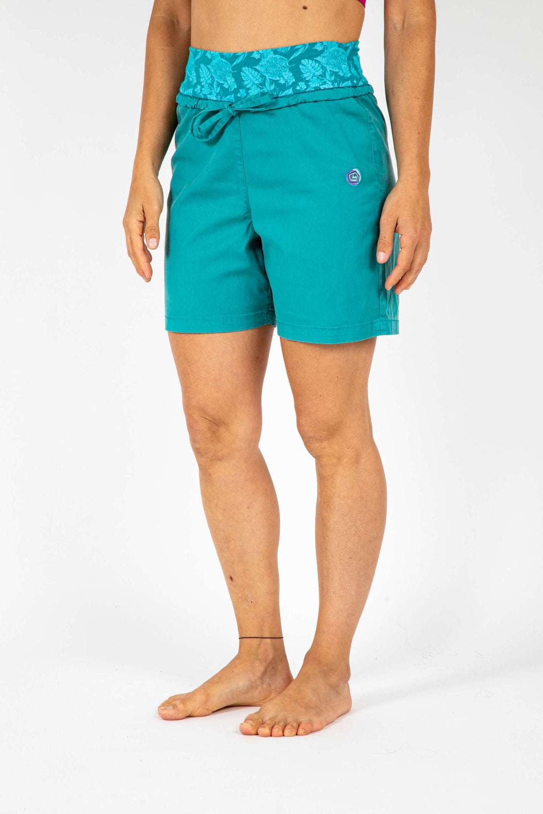 Outdoor and climbing shorts in teal, featuring adjustable waist and front embroidery. Made in Italy.