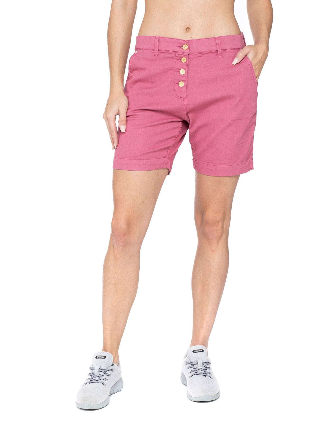 Women's pink shorts with wooden buttons, elastic waist, and front and back pockets.