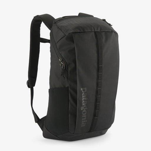 Black Hole Pack 25L backpack with recycled waterproof fabric and multiple compartments.