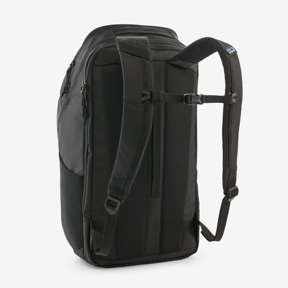 Black Hole Pack 32L backpack with recycled water-repellent fabric and multiple compartments.