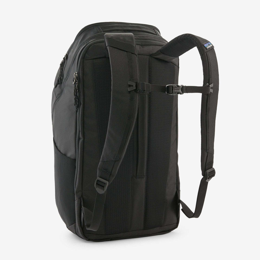 Black Hole Pack 32L backpack with recycled water-repellent fabric and multiple compartments.