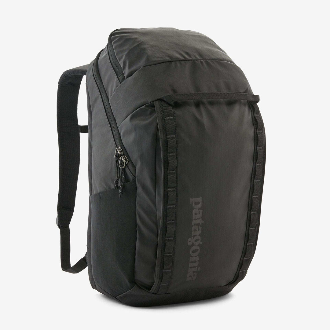 Black Hole Pack 32L backpack with recycled polyester, water-resistant TPU film, and Fair Trade Certified manufacturing.