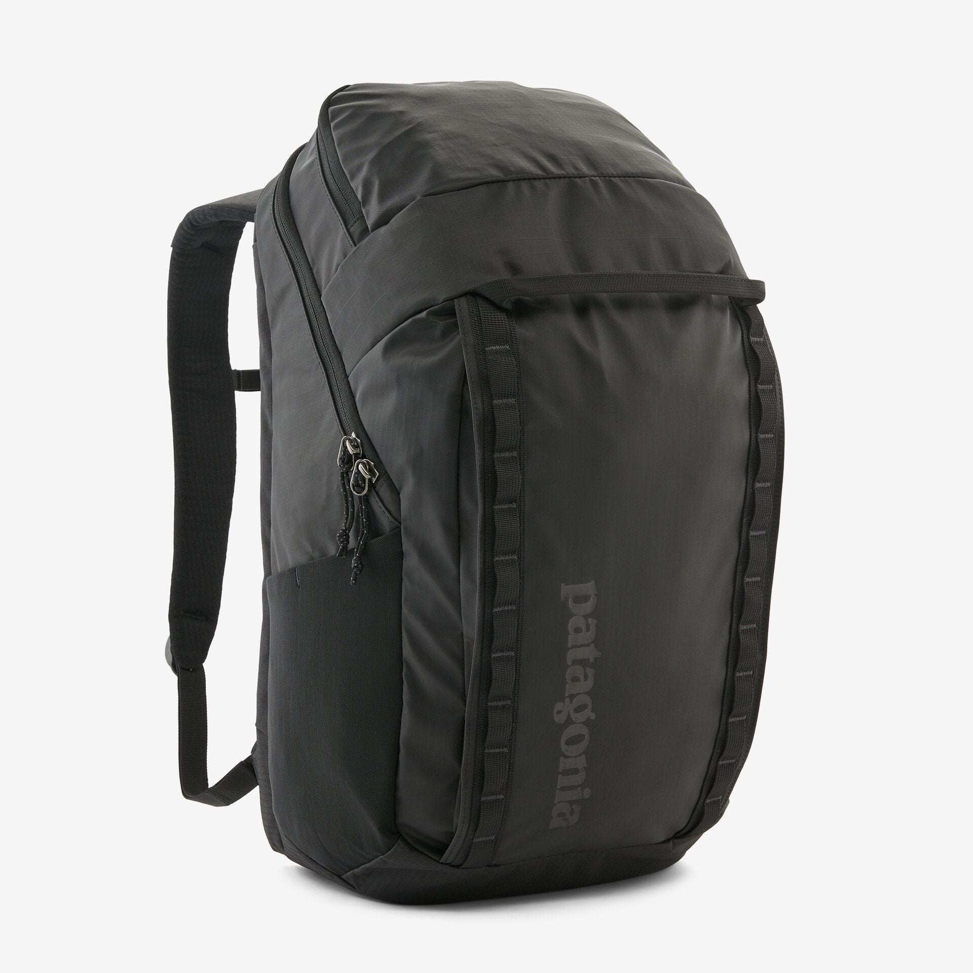 Black Hole Pack 32L backpack with recycled polyester, water-resistant TPU film, and Fair Trade Certified manufacturing.