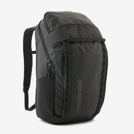 Black Hole Pack 32L backpack with recycled polyester, water-resistant TPU film, and Fair Trade Certified manufacturing.