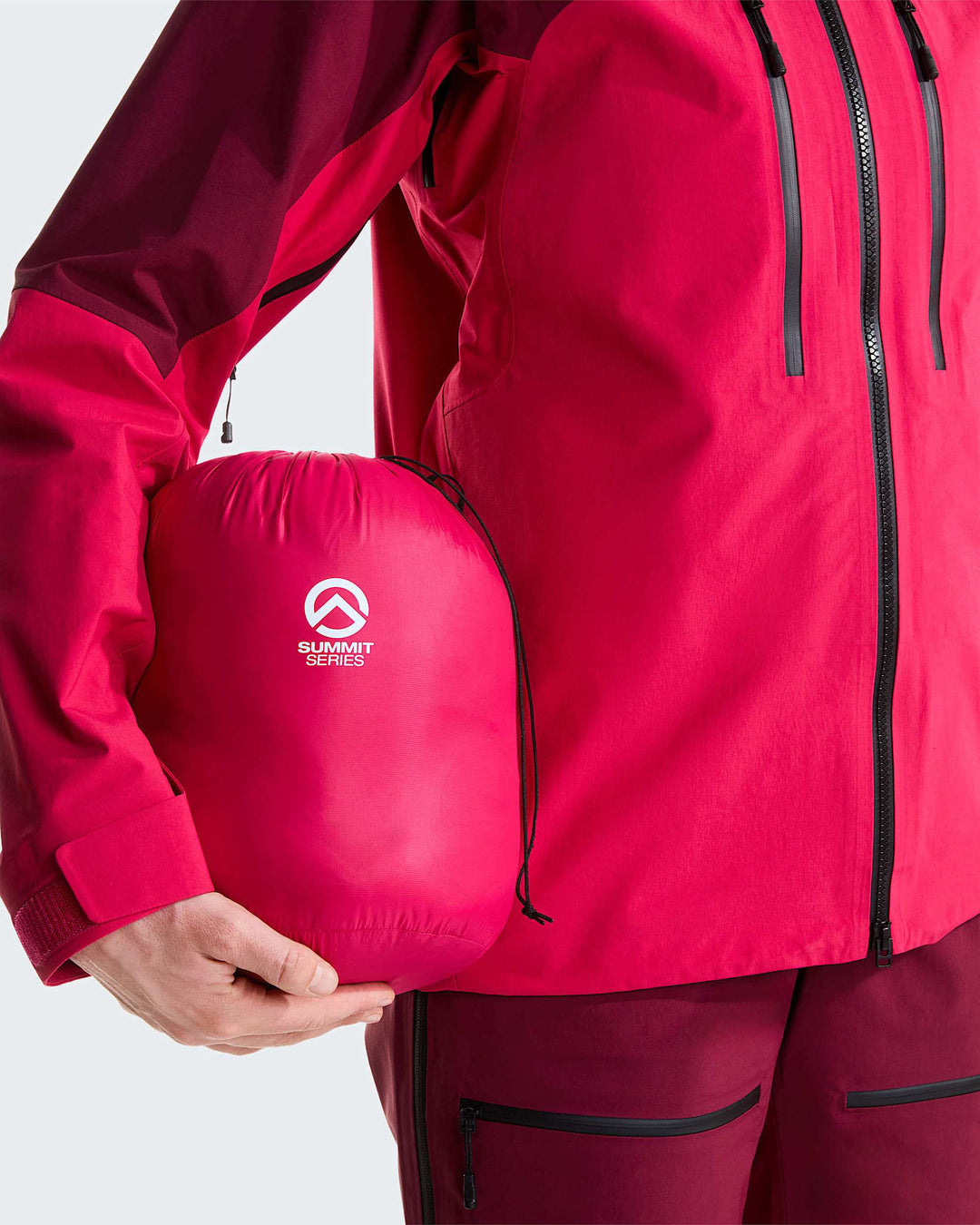 The North Face W Summit Pumori Down Parka - Lali Guran - included stuff sack / packed parka held by model