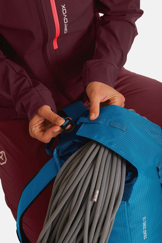 Lightweight Trad Zero 18 backpack for alpine climbing with rope loop in use.