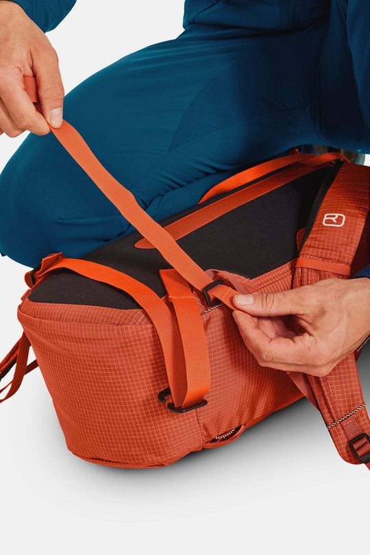 Lightweight Trad Zero 24 backpack for alpine climbing with durable 420D Ripstop material.