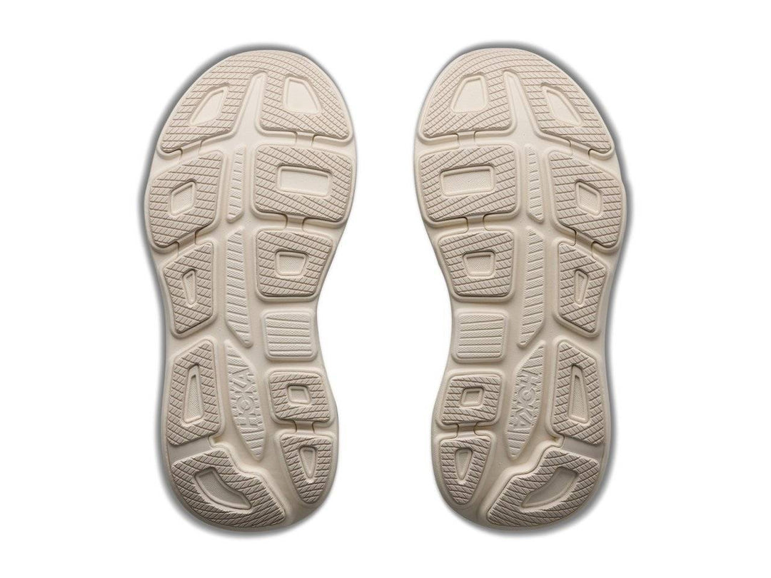 Suole color crema delle HOKA Bondi 9 GLM donna, vista dal basso