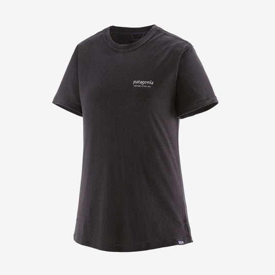 Women's Cap Cool Merino Graphic Shirt in black, featuring breathable merino wool blend for comfort and odor control, with RWS certification and Fair Trade Certified™ production.