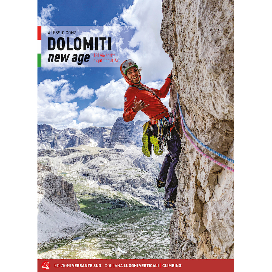 Climber scaling a rocky cliff in the Dolomiti New Age mountain range with scenic alpine background