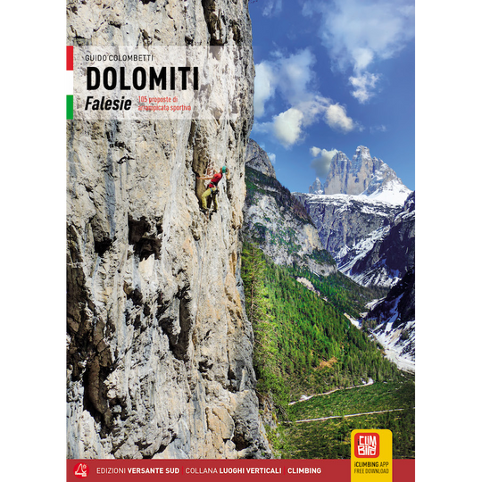 Climber scaling steep rock face in Dolomiti Falesie with mountainous landscape in background